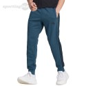 Spodnie męskie adidas Essentials French Terry Tapered Cuff 3-Stripes Pants niebieskie IJ8698 Adidas