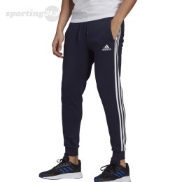 Spodnie męskie adidas Essentials Slim 3 Stripes Pants granatowe GM1090 Adidas