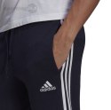 Spodnie męskie adidas Essentials Slim 3 Stripes Pants granatowe GM1090 Adidas