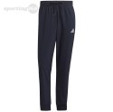 Spodnie męskie adidas Essentials Tapered Cuff 3 Stripes Pants granatowe GK8981 Adidas