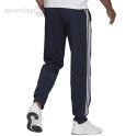 Spodnie męskie adidas Essentials Tapered Cuff 3 Stripes Pants granatowe GK8981 Adidas