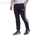 Spodnie męskie adidas Essentials Tapered Cuff 3 Stripes granatowe GK8977 Adidas