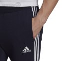 Spodnie męskie adidas Essentials Tapered Cuff 3 Stripes granatowe GK8977 Adidas