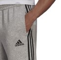 Spodnie męskie adidas Essentials Tapered Cuff 3 Stripes szare GK8976 Adidas