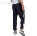 Spodnie męskie adidas Essentials Tapered Elastic Cuff 3 Stripes Pant granatowe GK8830 Adidas