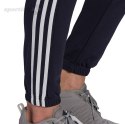 Spodnie męskie adidas Essentials Tapered Elastic Cuff 3 Stripes Pant granatowe GK8830 Adidas