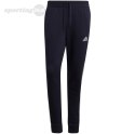 Spodnie męskie adidas Essentials Fleece Tapered Cuff 3-Band Pants granatowe GK8823 Adidas