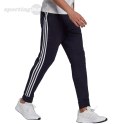 Spodnie męskie adidas Essentials Fleece Tapered Cuff 3-Band Pants granatowe GK8823 Adidas