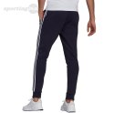 Spodnie męskie adidas Essentials Fleece Tapered Cuff 3-Band Pants granatowe GK8823 Adidas