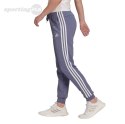 Spodnie damskie adidas Essentials French Terry 3-Stripes Pants fioletowe H42011 Adidas