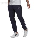 Spodnie męskie adidas Essentials Colorblock Fleece granatowe HK2884 Adidas