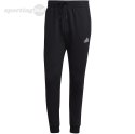 Spodnie męskie adidas Essentials Fleece Regular Tapered czarne HL2236 Adidas