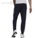 Spodnie męskie adidas Primegreen Essentials Warm-Up granatowe H46106 Adidas