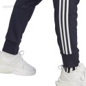 Spodnie męskie adidas Essentials French Terry Tapered Cuff 3-Stripes granatowe IC9406 Adidas