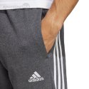 Spodnie męskie adidas Essentials French Terry Tapered Cuff 3-Stripes szare IC9408 Adidas