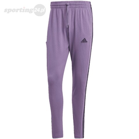 Spodnie męskie adidas Essentials Single Jersey Tapered Open Hem 3-Stripes fioletowe IJ8699 Adidas